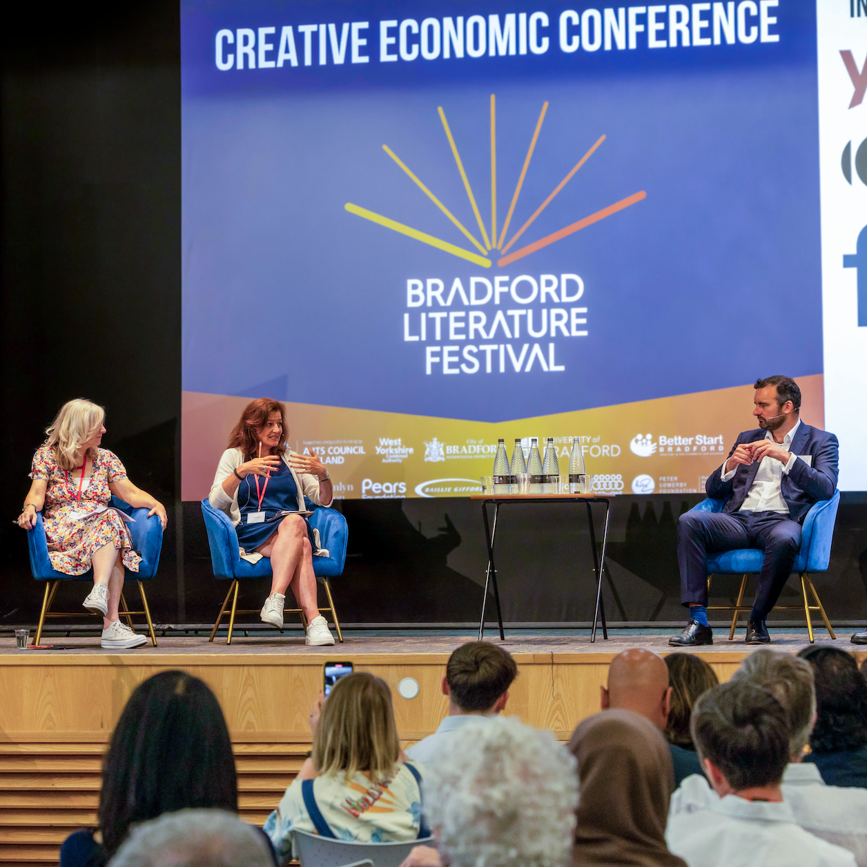 A panel discussion on stage at the CEC